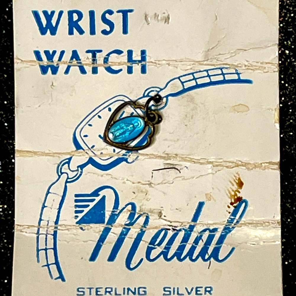 RARE new on original card Vintage 50s Virgin Mary Sterling Watch Charm